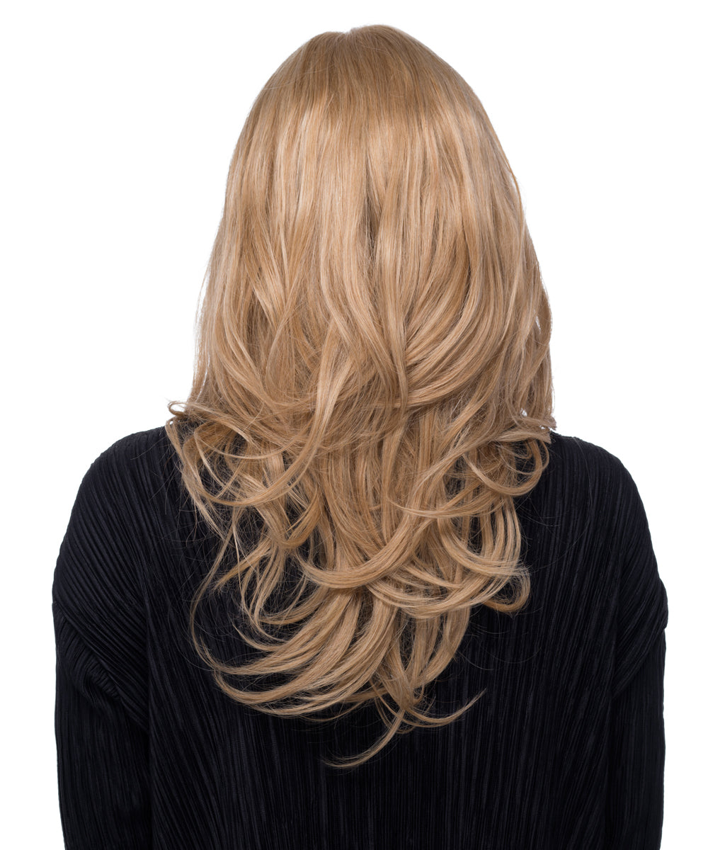 Blonde wig with wavy hair on a white background